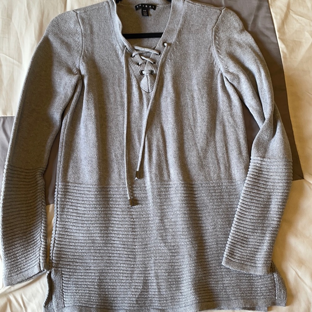 Tribal grey sweater. V neck with tassel.